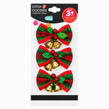 Three green and red plaid Christmas bows with gold bells and holly decoration