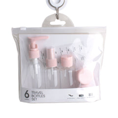 Travel Bottle Set containing six clear bottles with pink caps in a convenient travel bag.