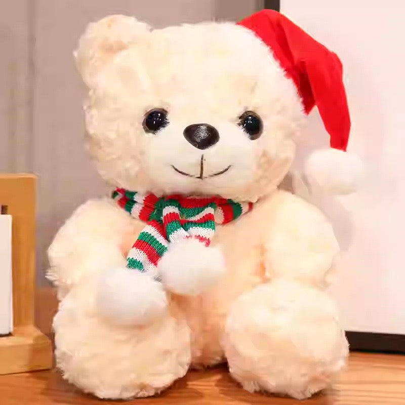 Christmas Teddy Plush Toy – Soft & Safe Kids Gift(23CM) featuring a cute bear with Santa hat and striped scarf.