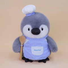 Artist Penguin Plush(30CM) dressed as a chef with a spoon, perfect for cuddling and play.