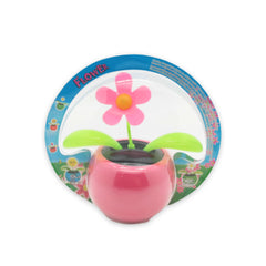 Solar Dancing Flower Pot Toy featuring a pink flower in a colorful pot with a transparent cover.