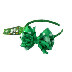St Paddy Ribbon Hair Band featuring a green polka dot bow for St. Patrick's Day celebrations.