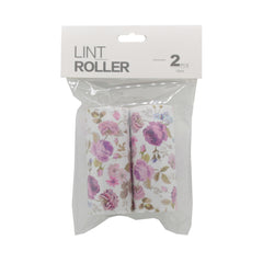 Lint Roller Replacement (2PCS) pack with floral design sticky rolls for removing lint and pet hair from clothing.