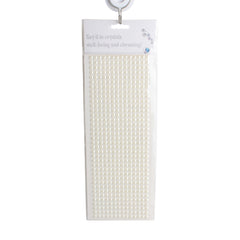 Adhesive Pearl(6MM) pack featuring multiple adhesive pearls on a clear backing for crafting and decoration.