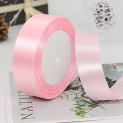 ๐งต Premium Satin Ribbon โ Versatile & Elegant in soft pink, perfect for gift wrapping and crafting projects.