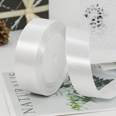 Premium Satin Ribbon โ Versatile & Elegant in white, ideal for gift wrapping and craft projects.