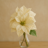 🌸 Premium Artificial Christmas Flower (Single Stem) in a clear vase, showcasing vibrant festive charm.