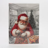 X-mas Melody Card(XC383) featuring Santa preparing Christmas chocolates in a festive setting.