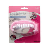 Garlic Presser in a pink packaging, showcasing its 2-in-1 multifunctional design for effortless garlic crushing.