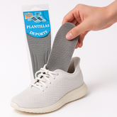 Comfort Foam Insoles – All-Day Cushion Support being inserted into a white athletic shoe for enhanced comfort.