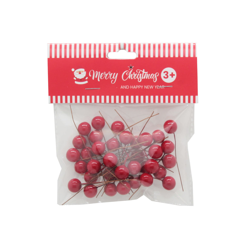 X-mas Craft Holly(1.2CM,36PCS) in a festive packaging with red berries for holiday crafts.