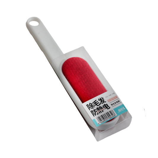 Lint Brush(Q) in packaging, featuring a red lint removal surface and a white handle, ideal for pet hair and lint removal.