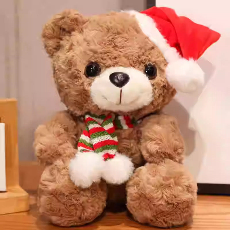 Christmas Teddy Plush Toy – Soft & Safe Kids Gift(23CM) wearing a Santa hat and striped scarf, perfect for holiday gifting.