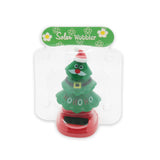 Solar Dancing Christmas Dashboard Toy in packaging, featuring a green Christmas tree with a joyful expression.