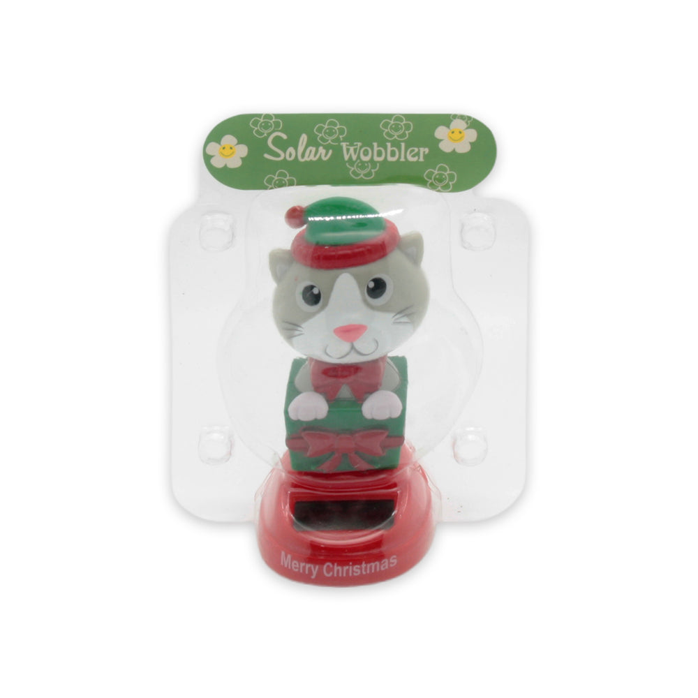 Solar Dancing Christmas Dashboard Toy featuring a cheerful cat in a festive hat and scarf.