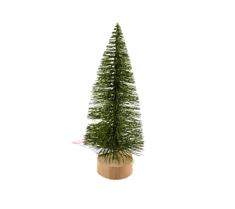 X-mas Tree (Mi/G) displayed on a wooden base, featuring green bristles for holiday decor.