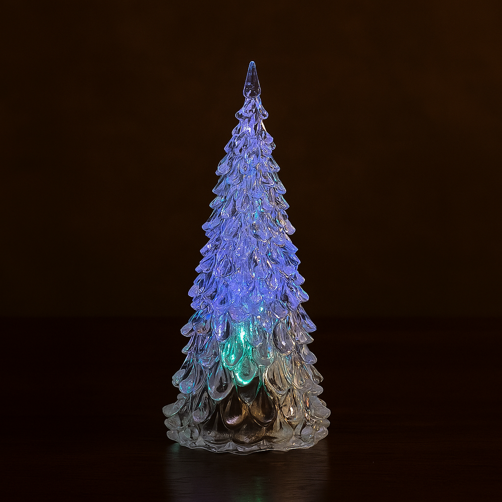 🎄 X-mas Flashing Tree (12.5CM) glowing with colorful lights, perfect for holiday decoration in any cozy corner.