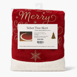 V. Christmas Tree Skirt in red velvet with white fur trim and gold embroidery detailing.