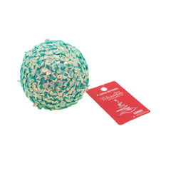 A decorative Christmas Ball(B) in teal with shiny star shapes and a red tag reading 'Christmas'.