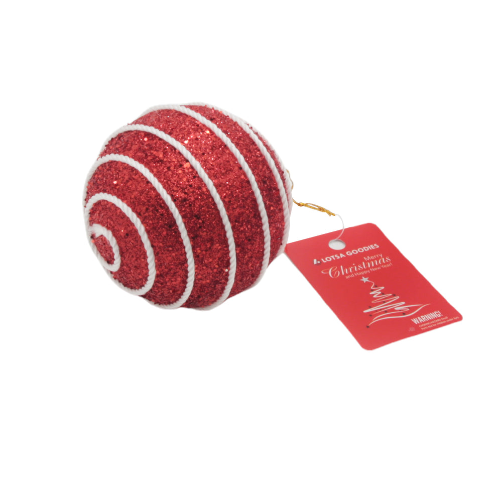 Sparkling red Christmas Ball(R) ornament with white spirals and a festive tag.