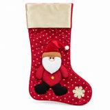 Red Christmas stocking with Santa and gold cuff