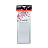 Magnetic Memo Pad with a floral design and wooden clip for jotting down notes.