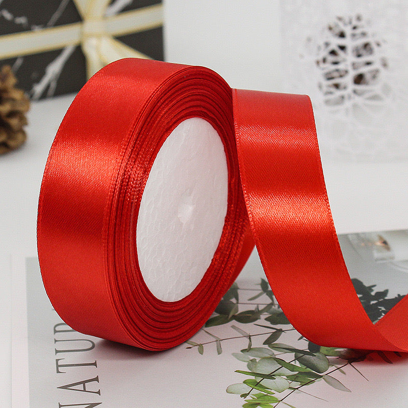 🧵 Premium Satin Ribbon – Versatile & Elegant in vibrant red, perfect for gift wrapping and elegant crafts.