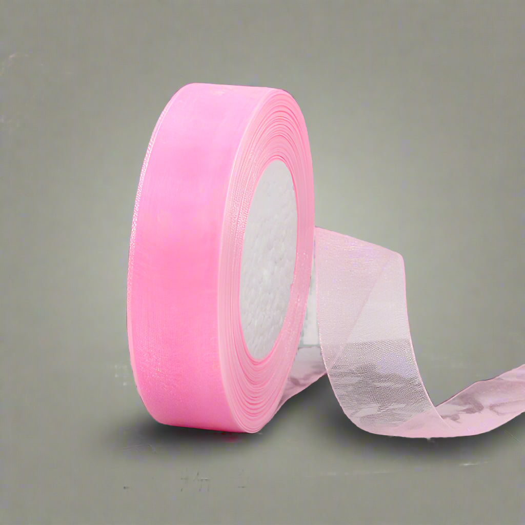 🎀 Sheer Organza Ribbon – Elegant & Versatile Finish in soft pink roll, perfect for gift wrapping and décor.