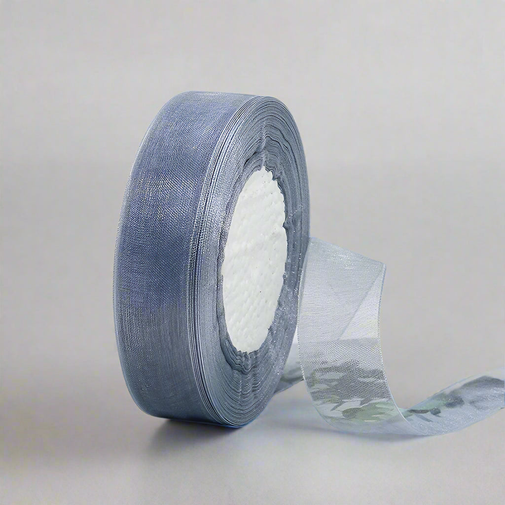 🎀 Sheer Organza Ribbon – Elegant & Versatile Finish on a spool with a soft blue sheen, ideal for crafts and decorations.