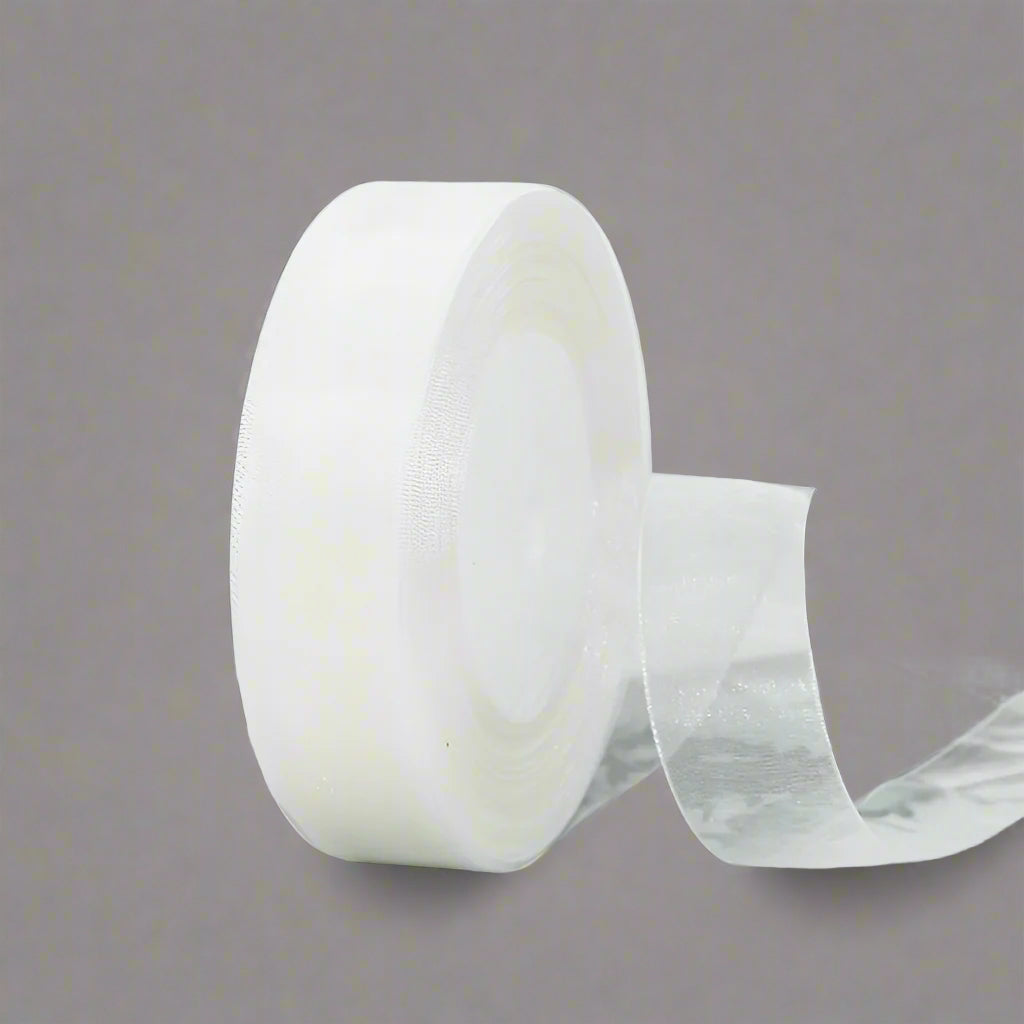🎀 Sheer Organza Ribbon – Elegant & Versatile Finish roll on a gray background, perfect for gift wrapping and crafts.