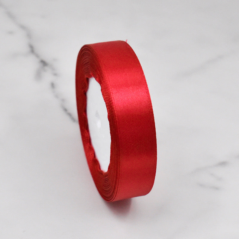 🧵 Premium Satin Ribbon – Versatile & Elegant in vibrant red, ideal for gift wrapping and crafting.