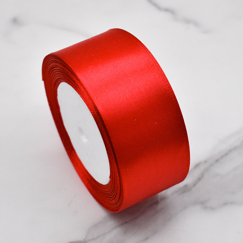 🧵 Premium Satin Ribbon – Versatile & Elegant in glossy red, perfect for gift wrapping and crafting.