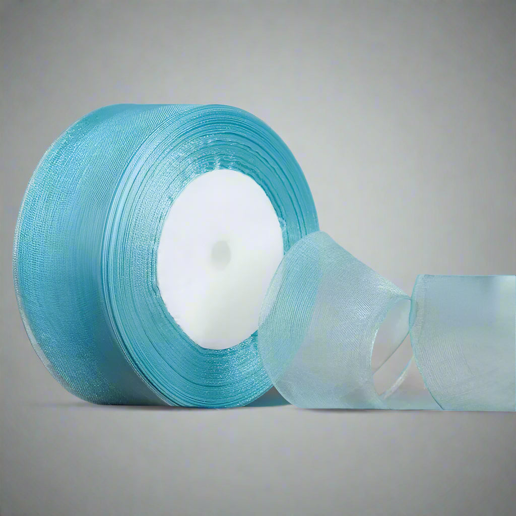🎀 Sheer Organza Ribbon – Elegant & Versatile Finish in turquoise, perfect for versatile decorating and crafting.