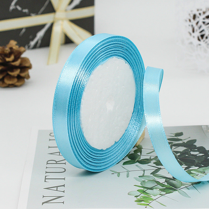 🧵 Premium Satin Ribbon – Versatile & Elegant in vibrant blue, perfect for gift wrapping, crafts, and decorations.