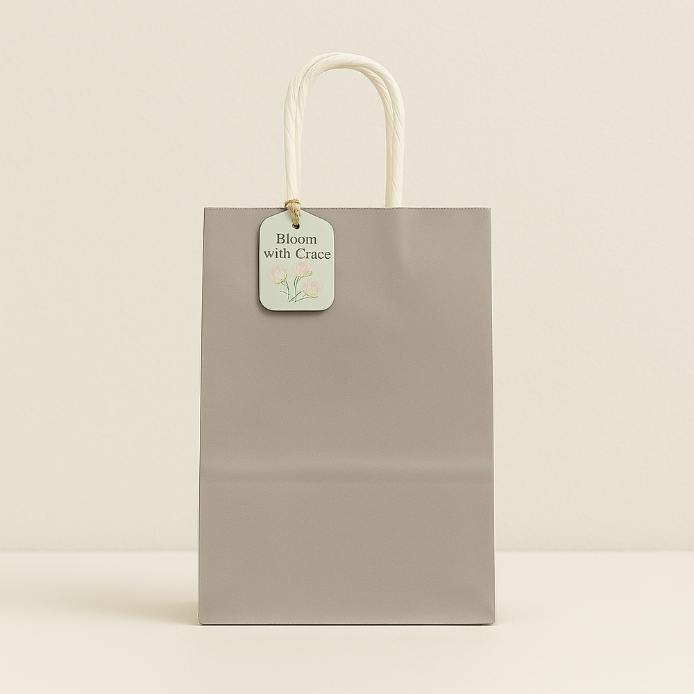 🛍️ Premium Paper Gift Bags – 4-Pack Assorted Colors (12*14*6CM) in gray with twisted handle and floral tag.