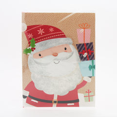 X-mas Melody Card(XC265) featuring a cheerful Santa holding gifts and a festive background.