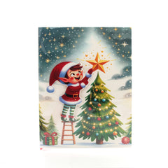 X-mas Melody Card(XC365) featuring an elf placing a star on a Christmas tree.