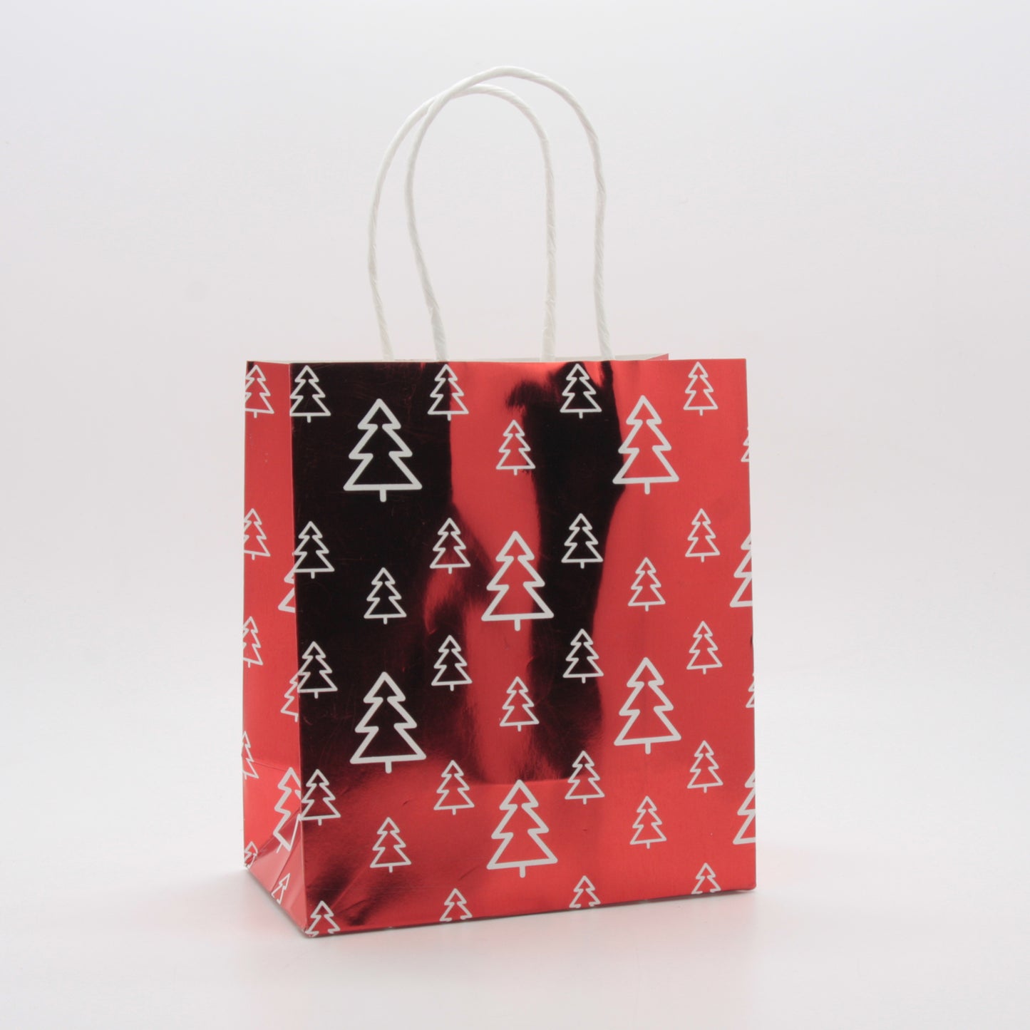 Foil Christmas Paper Bag(31*24*12CM/9183L) featuring a festive tree design on a red and black background.