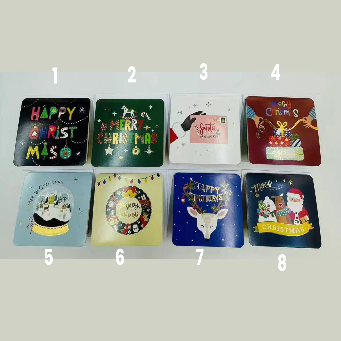 Various colorful designs of 3D Pop-Up Christmas Cards showcasing festive greetings and illustrations.