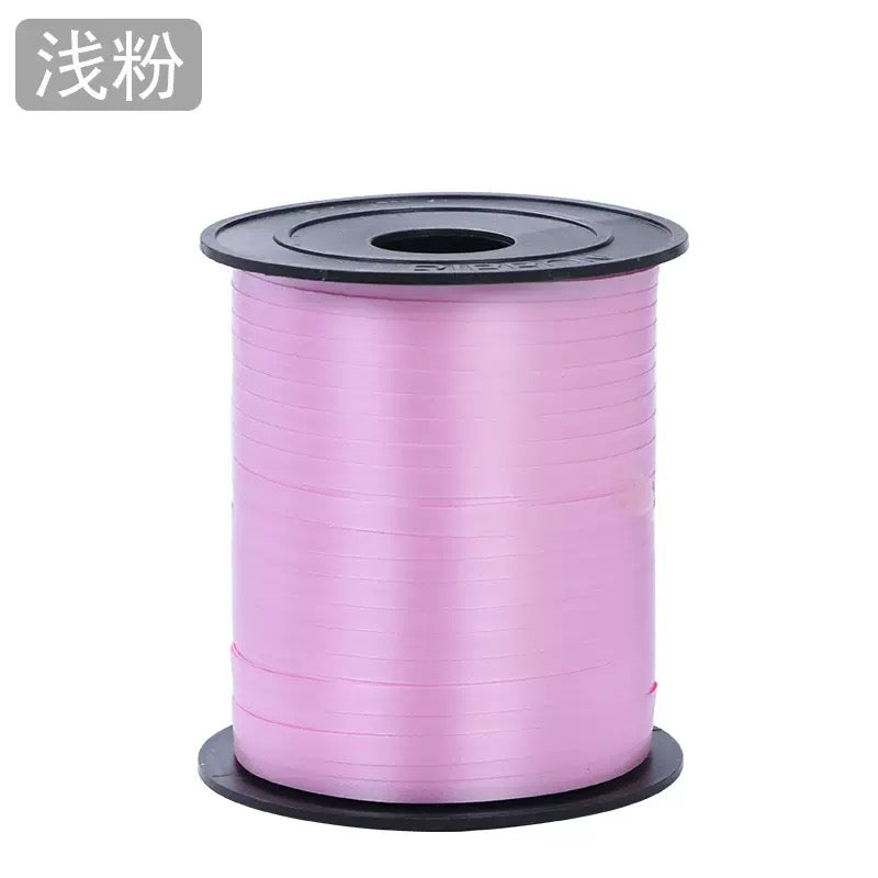 Curling Ribbon Roll(0.5CM*200M/Dark Pink) on a spool, perfect for gift wrapping and decorations.