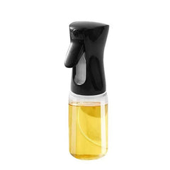 Oil Spray Bottle(220ML) with a sleek black nozzle and transparent body filled with oil.