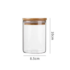 Glass Storage Jar with Wooden Lid(8.5*10CM) showcasing its sleek design and dimensions 8.5cm by 10cm.